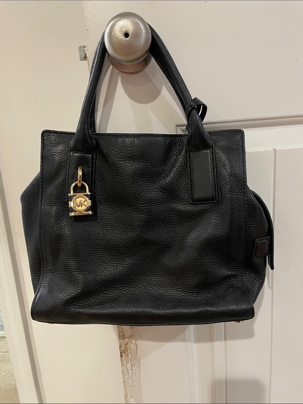 Michael Kors Black Pebbled Leather Pocet Book with Gold Padlock Charm